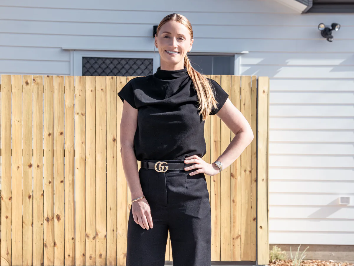 Lauren Jones, director of Yield Street Property Buyers, standing in front of her rooming house